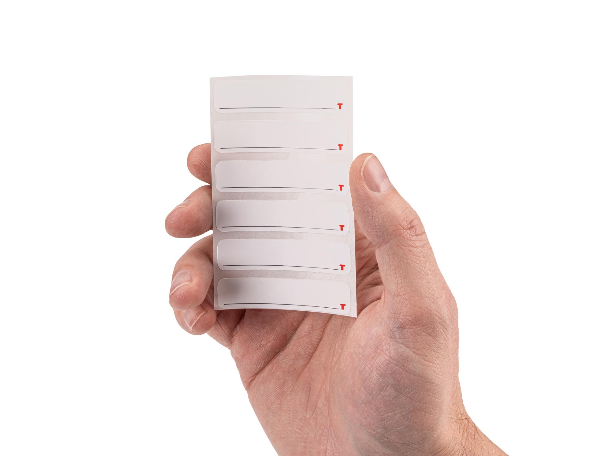 Person holding Tekton stacking organization system. Item #OLB98002