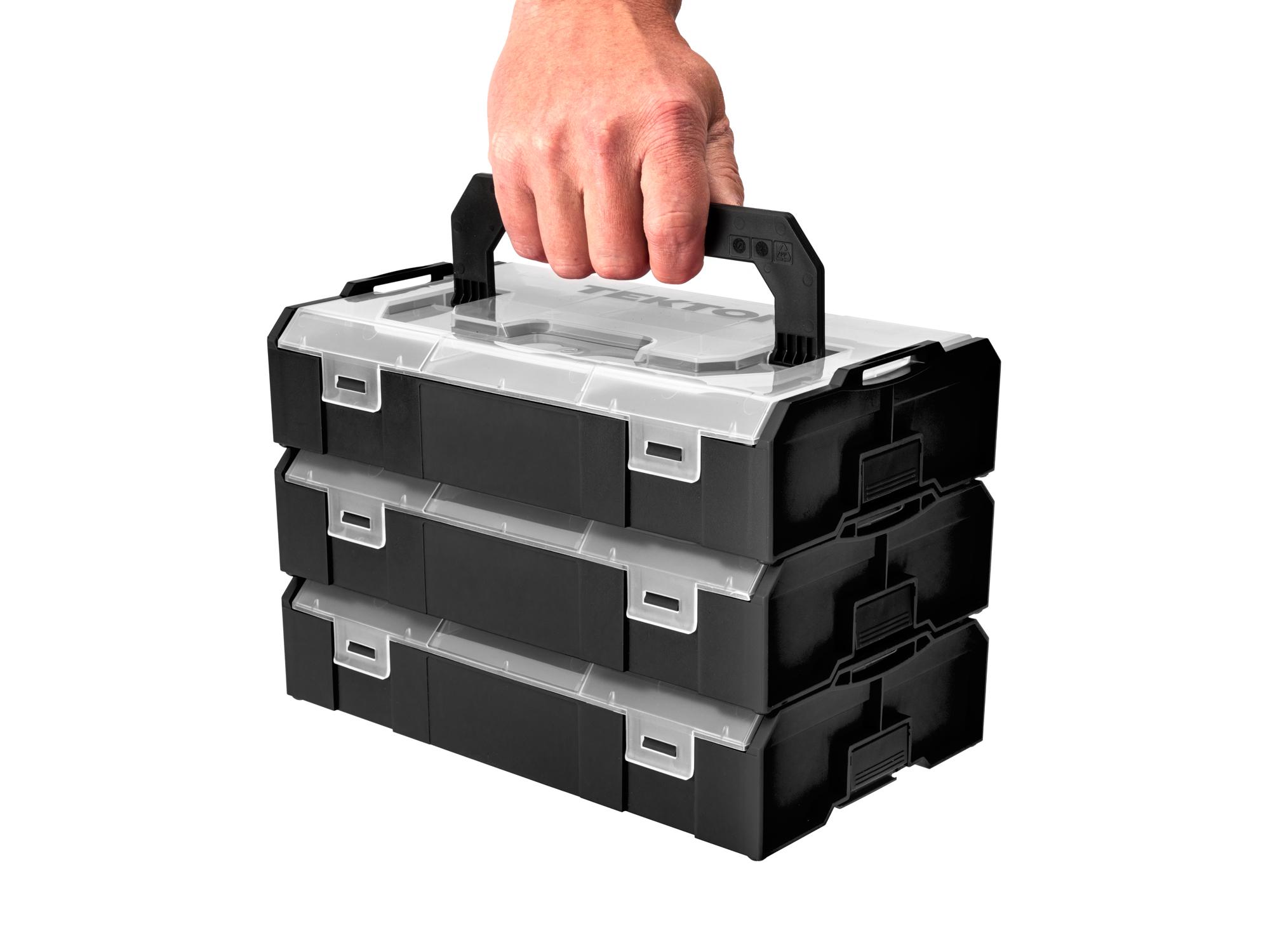 Person holding Tekton black stacking organization system set. Item #OLM97000