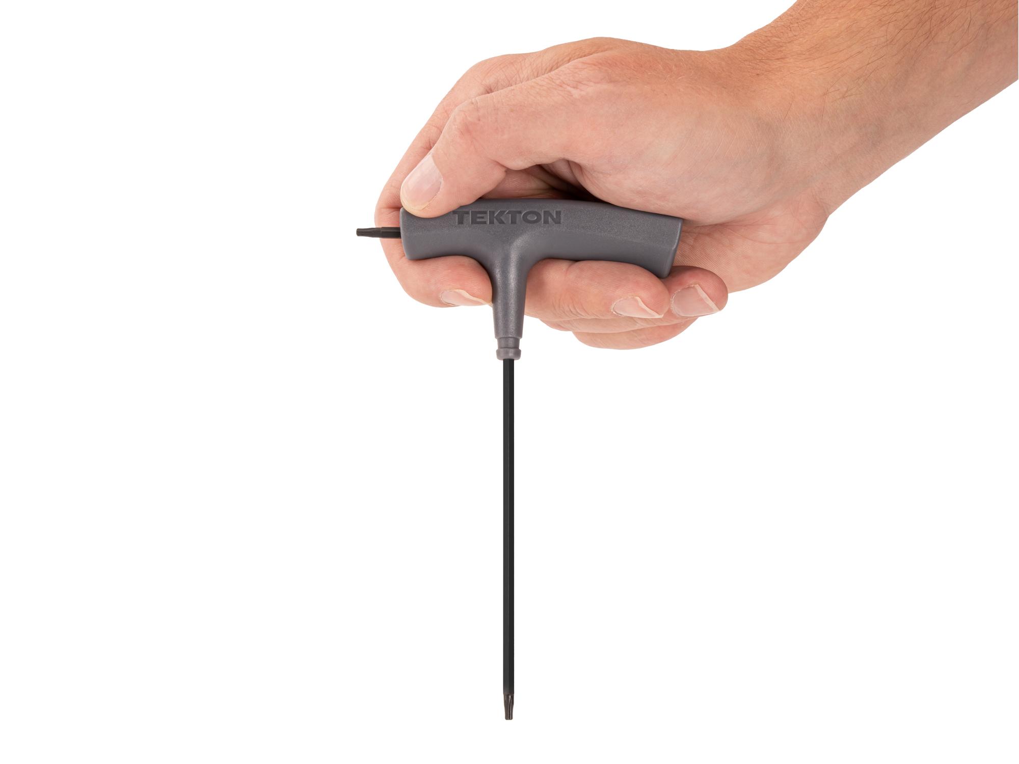 Person holding Tekton t-handle key. Item #KTT32090