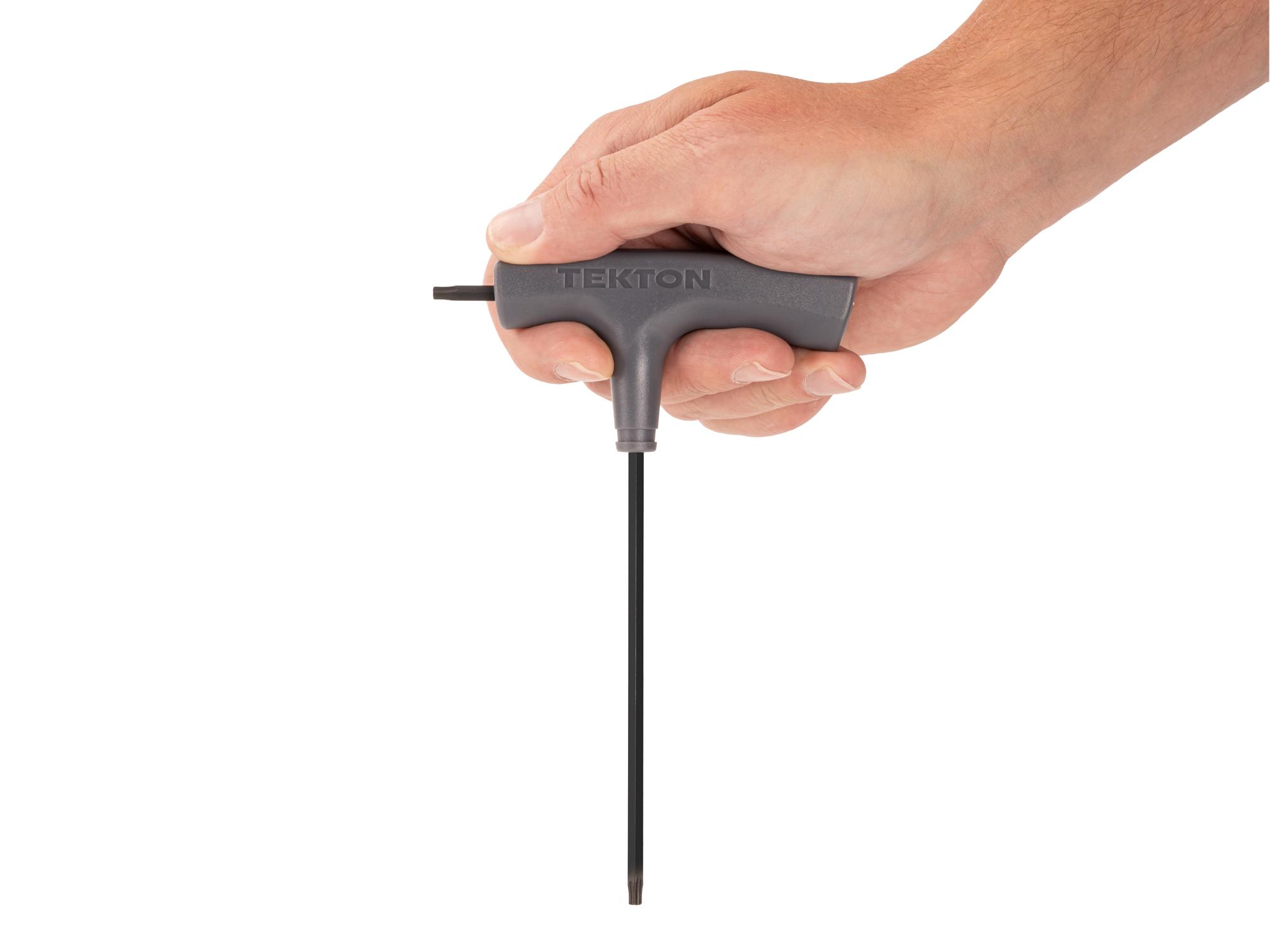 Person holding Tekton t-handle key. Item #KTT32200