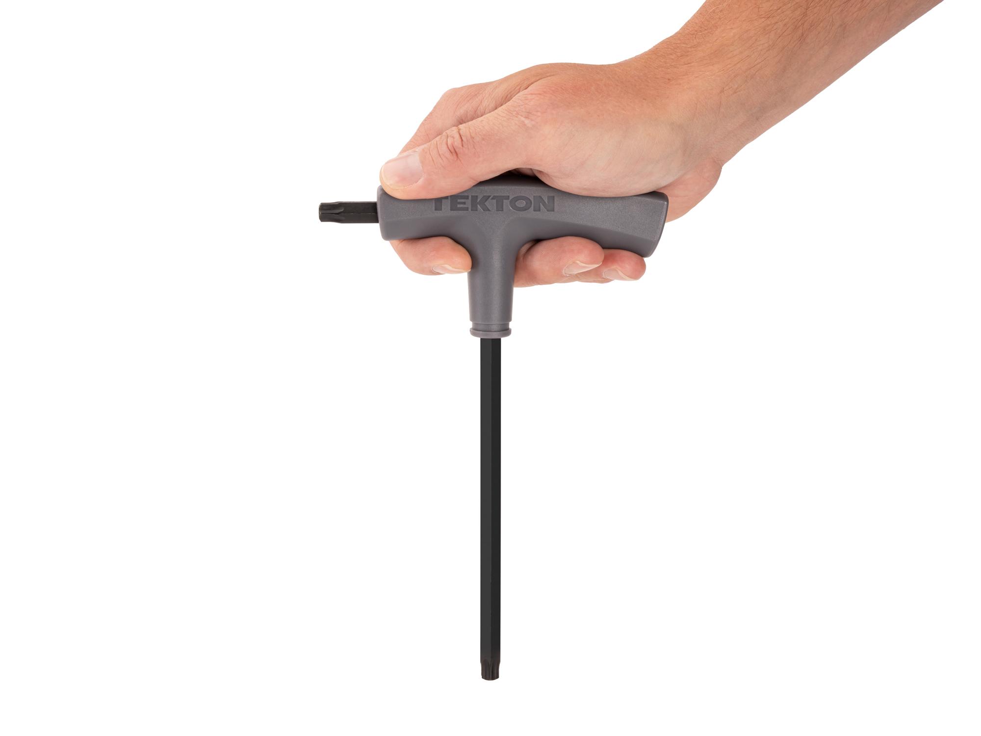 Person holding Tekton t-handle key. Item #KTT32450