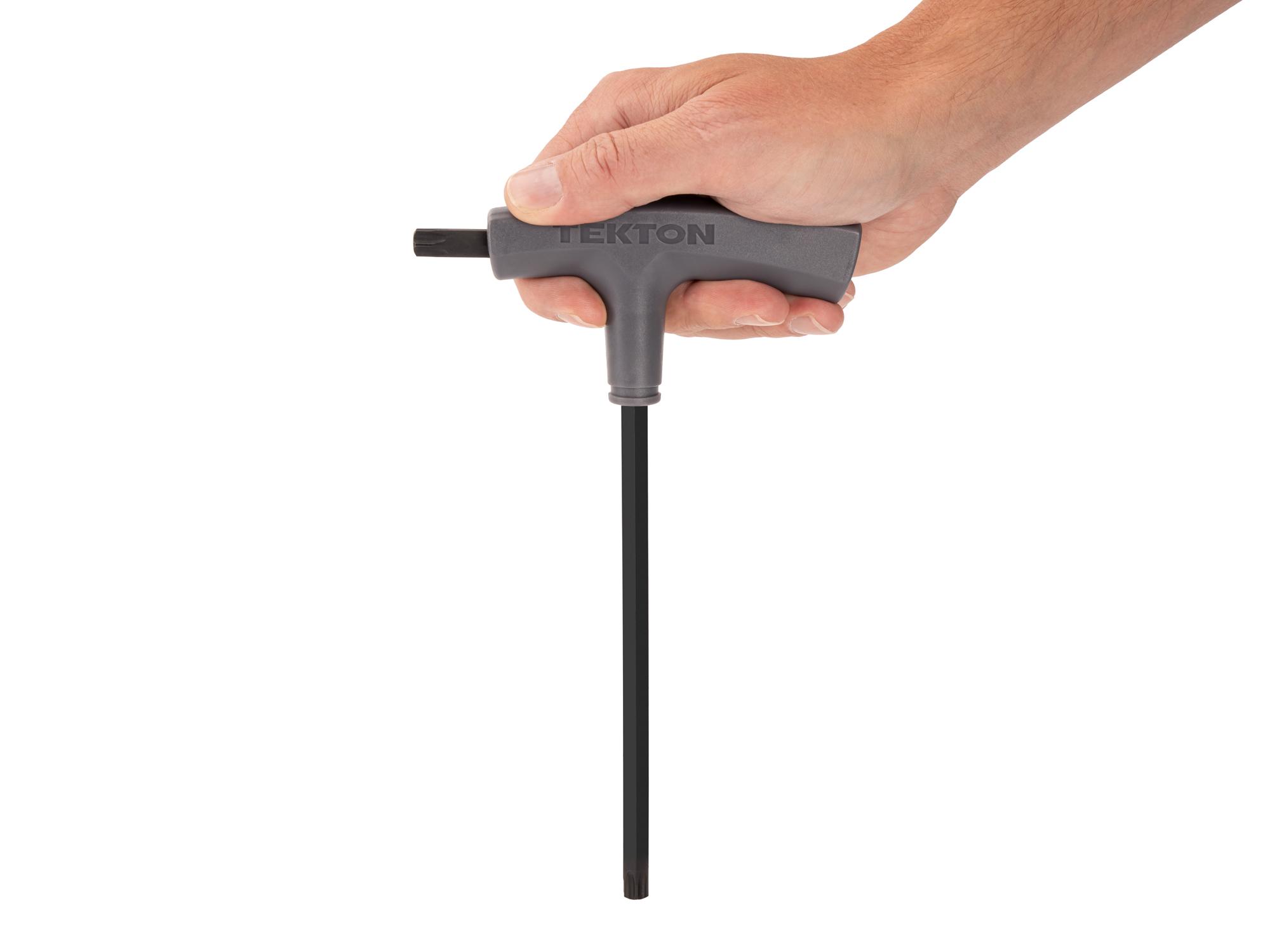 Person holding Tekton t-handle key. Item #KTT32500