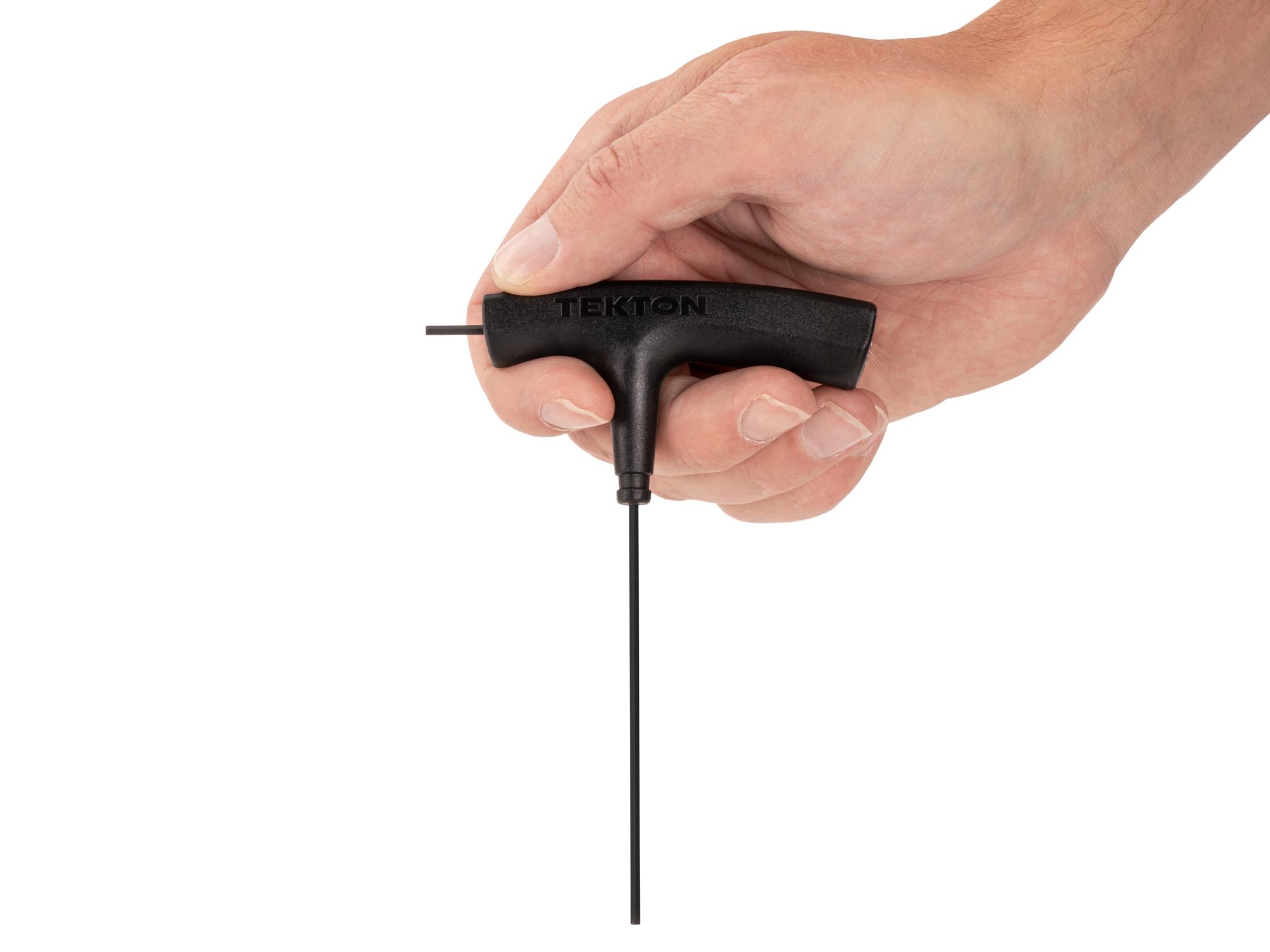 Person holding Tekton t-handle key. Item #KTX31078