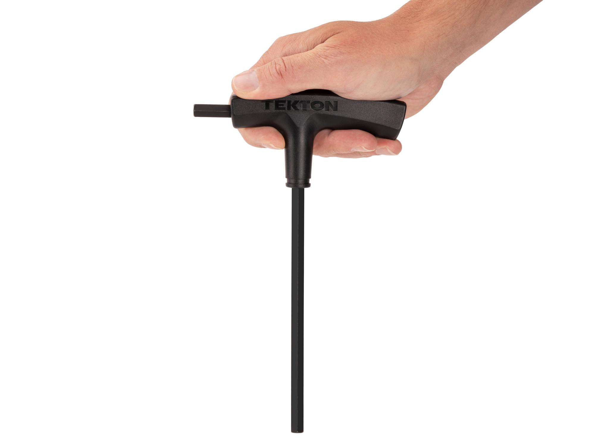 Person holding Tekton t-handle key. Item #KTX31313
