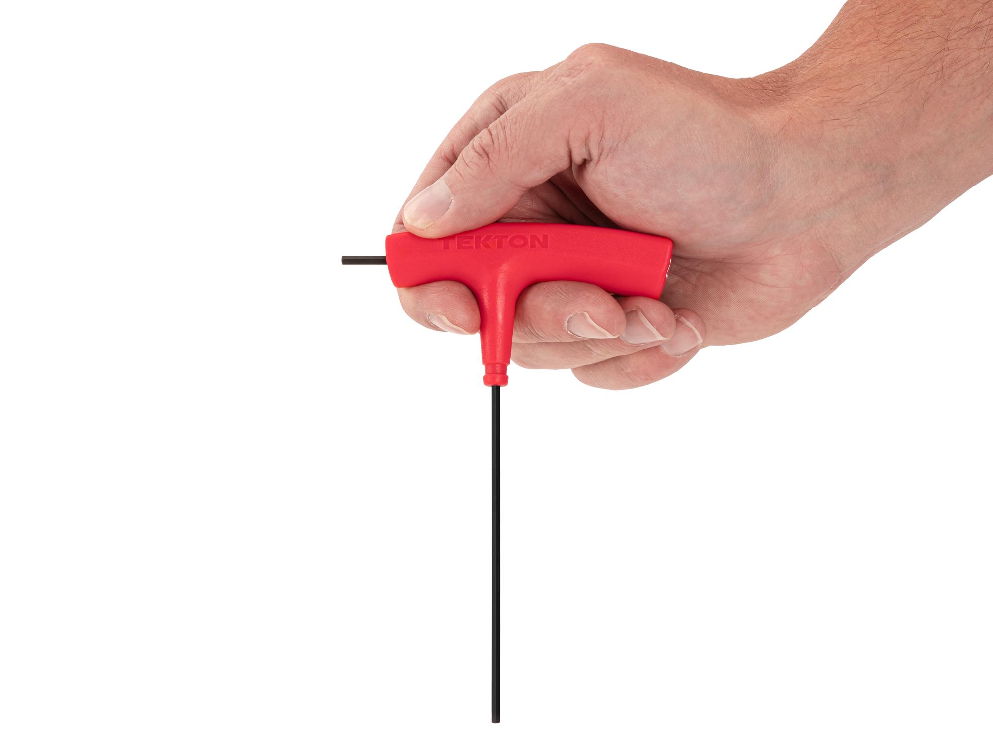 Person holding Tekton t-handle key. Item #KTX32025