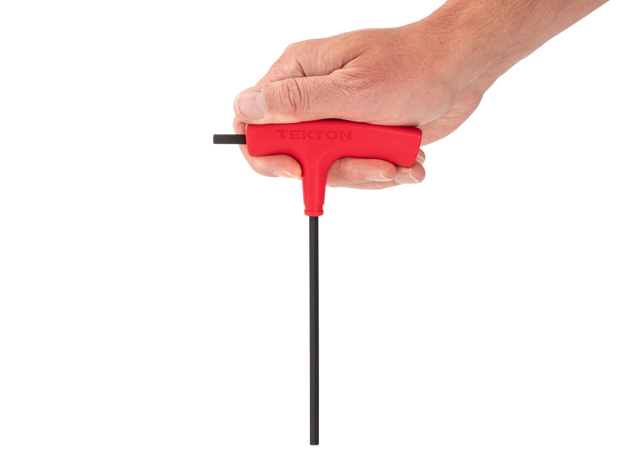 Person holding Tekton t-handle key. Item #KTX32050