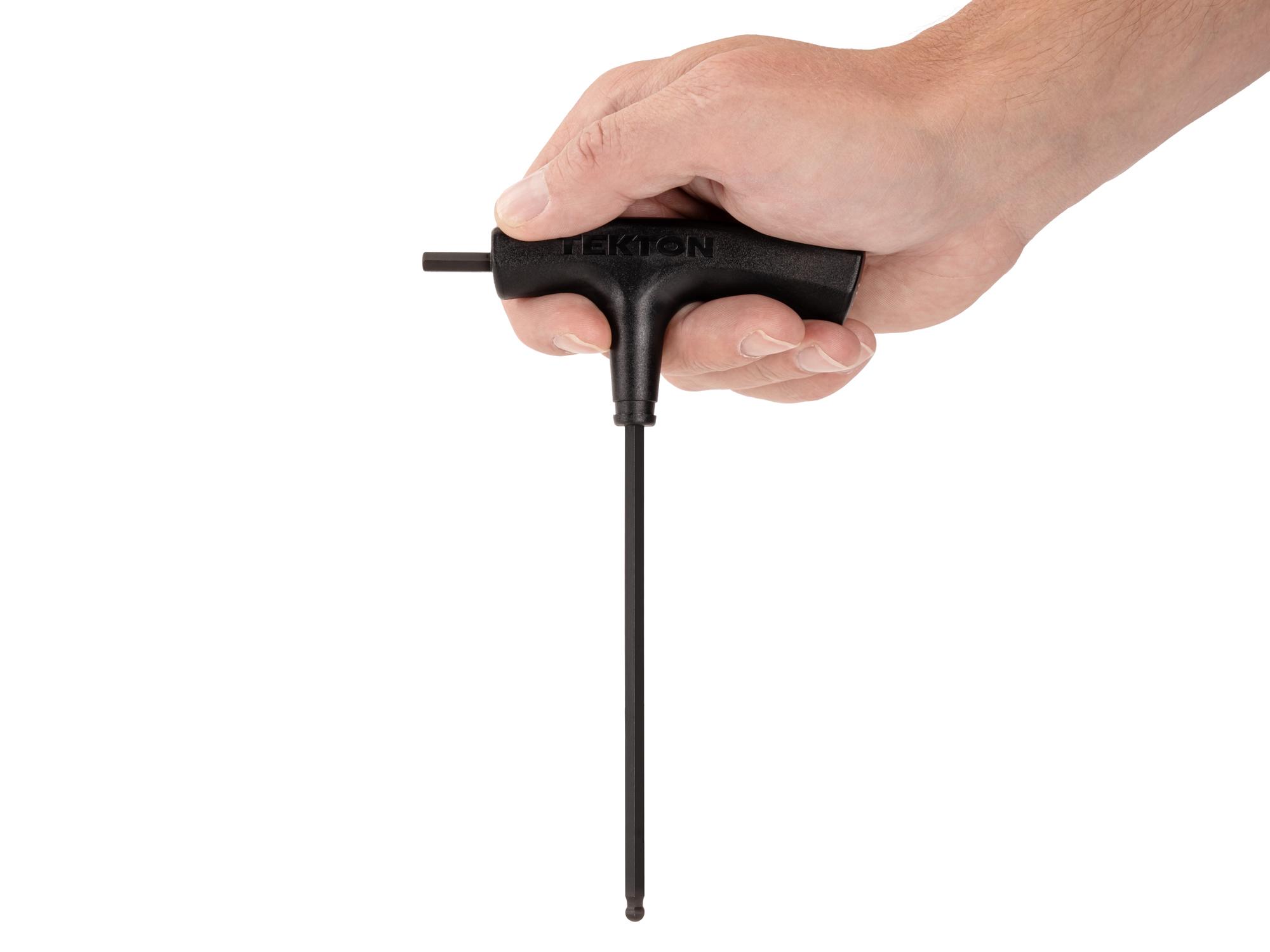 Person holding Tekton t-handle key. Item #KTX37188