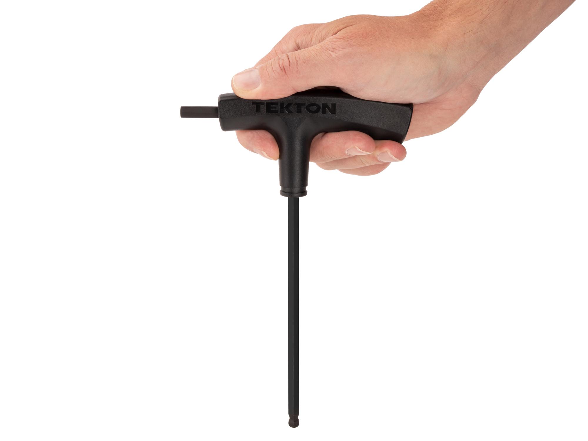 Person holding Tekton t-handle key. Item #KTX37250