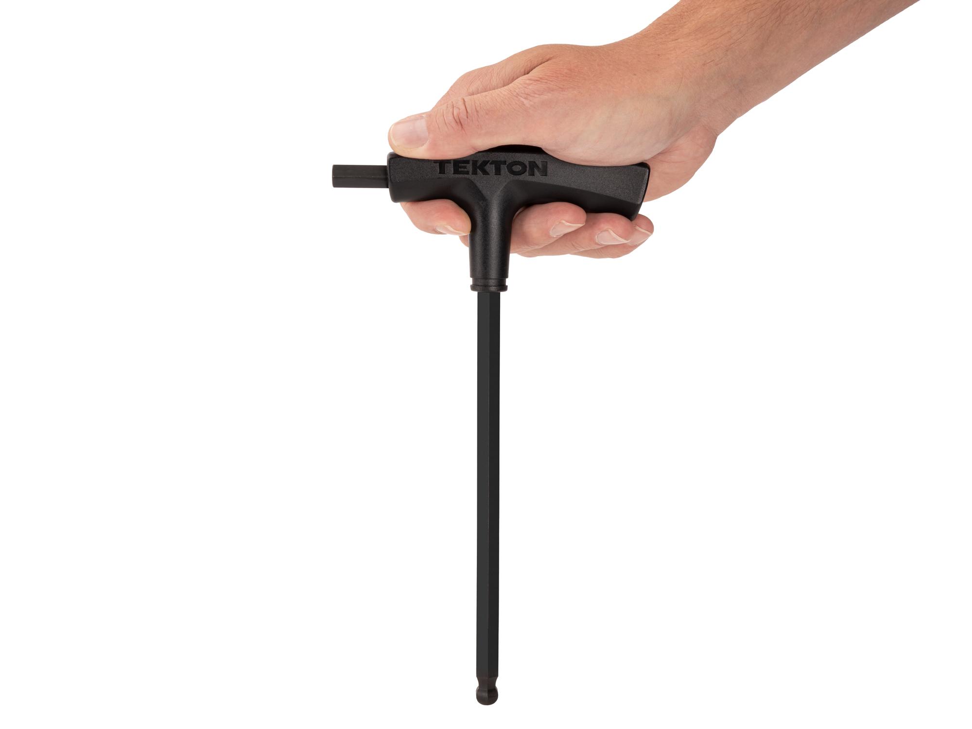 Person holding Tekton t-handle key. Item #KTX37375
