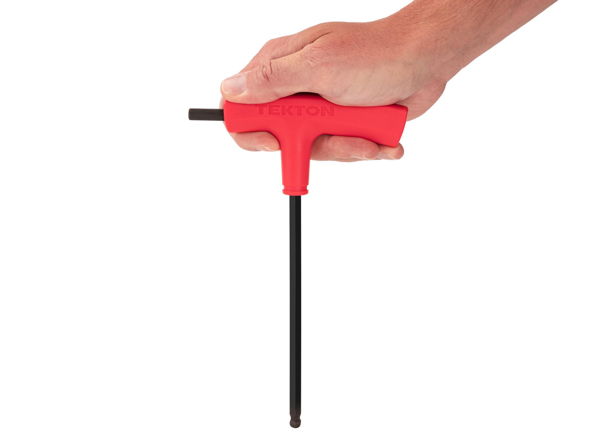 Person holding Tekton t-handle key. Item #KTX38070