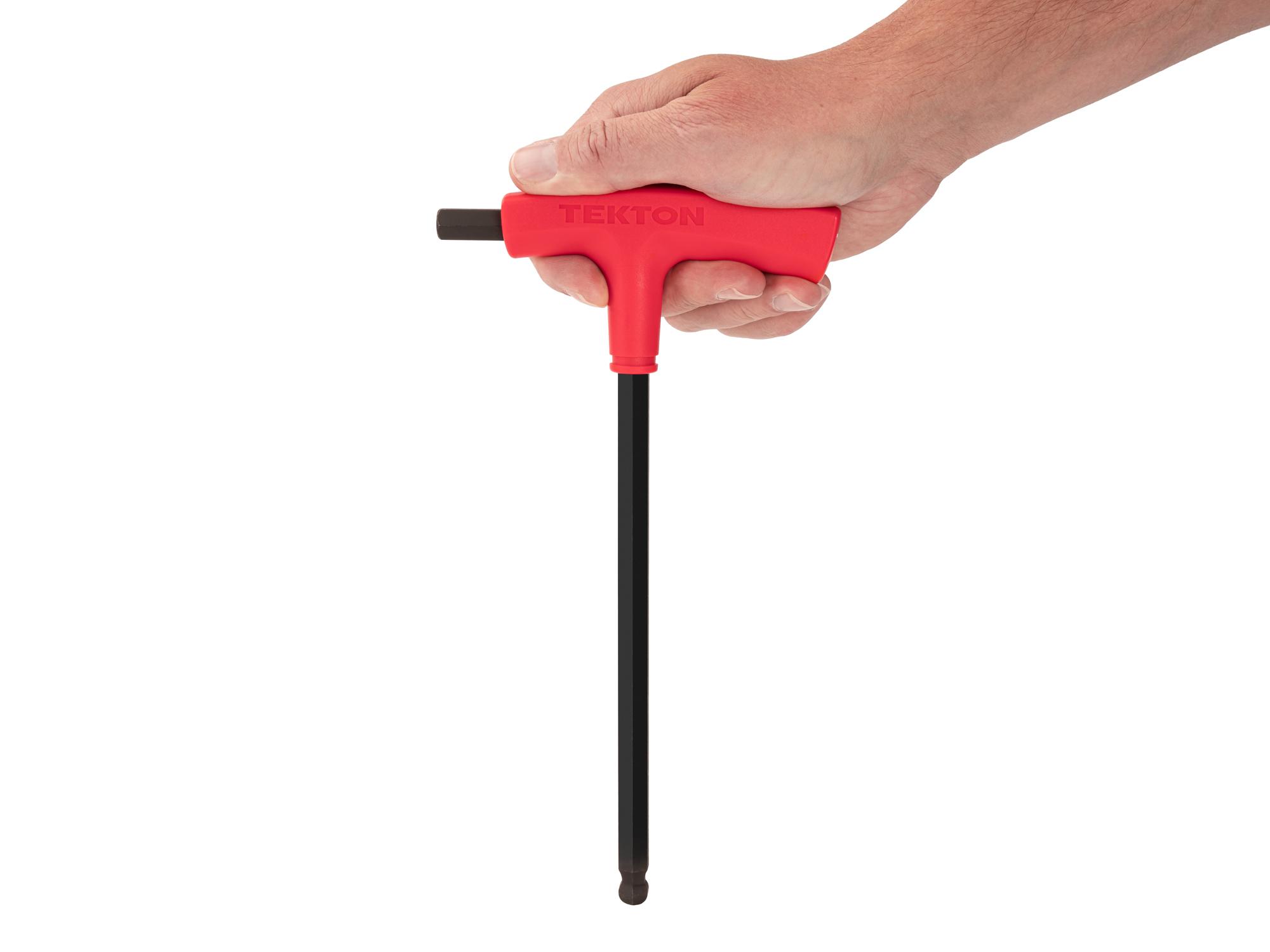 Person holding Tekton t-handle key. Item #KTX38100
