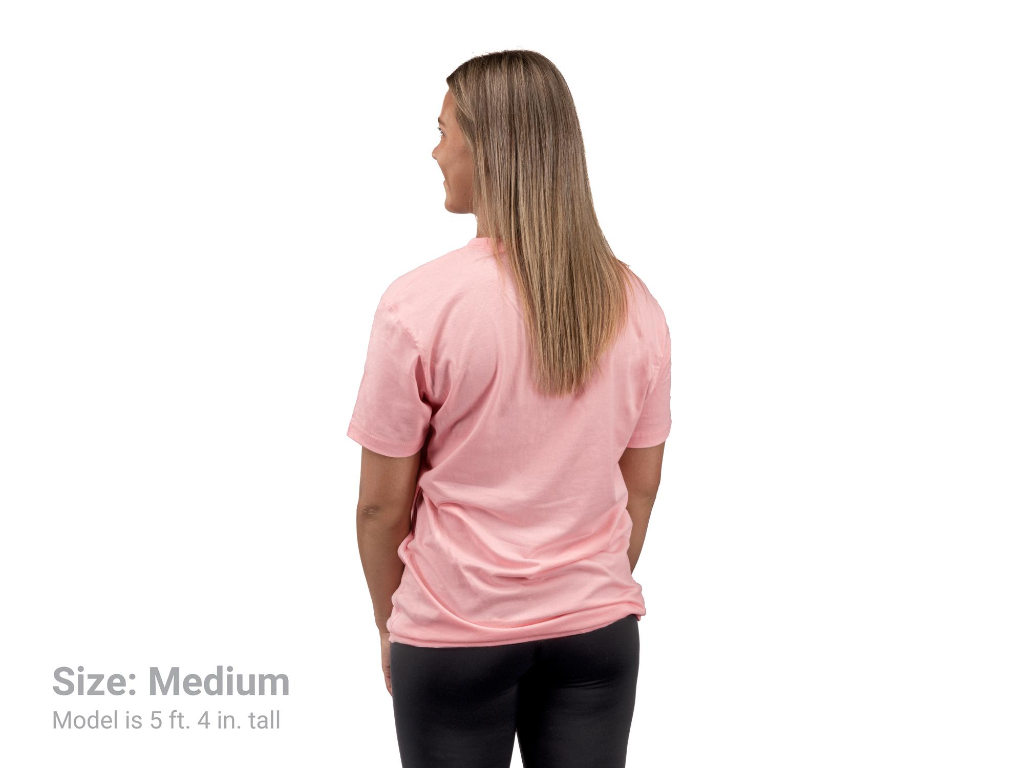 Back view of a woman wearing a pink Tekton tee. Item #APG32042