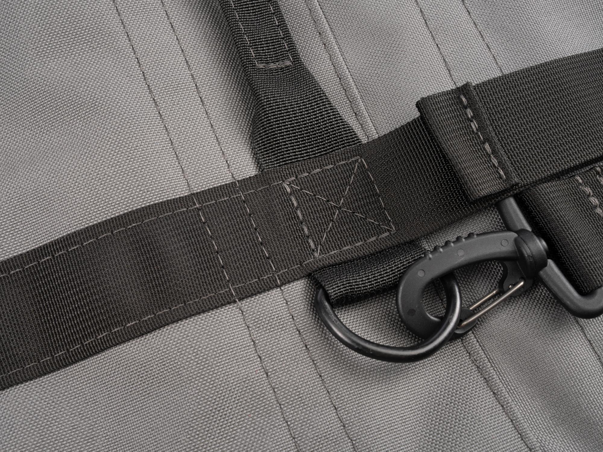 Closeup view of tactical-gray-red Tekton roll tool pouch. Item #EXP00011