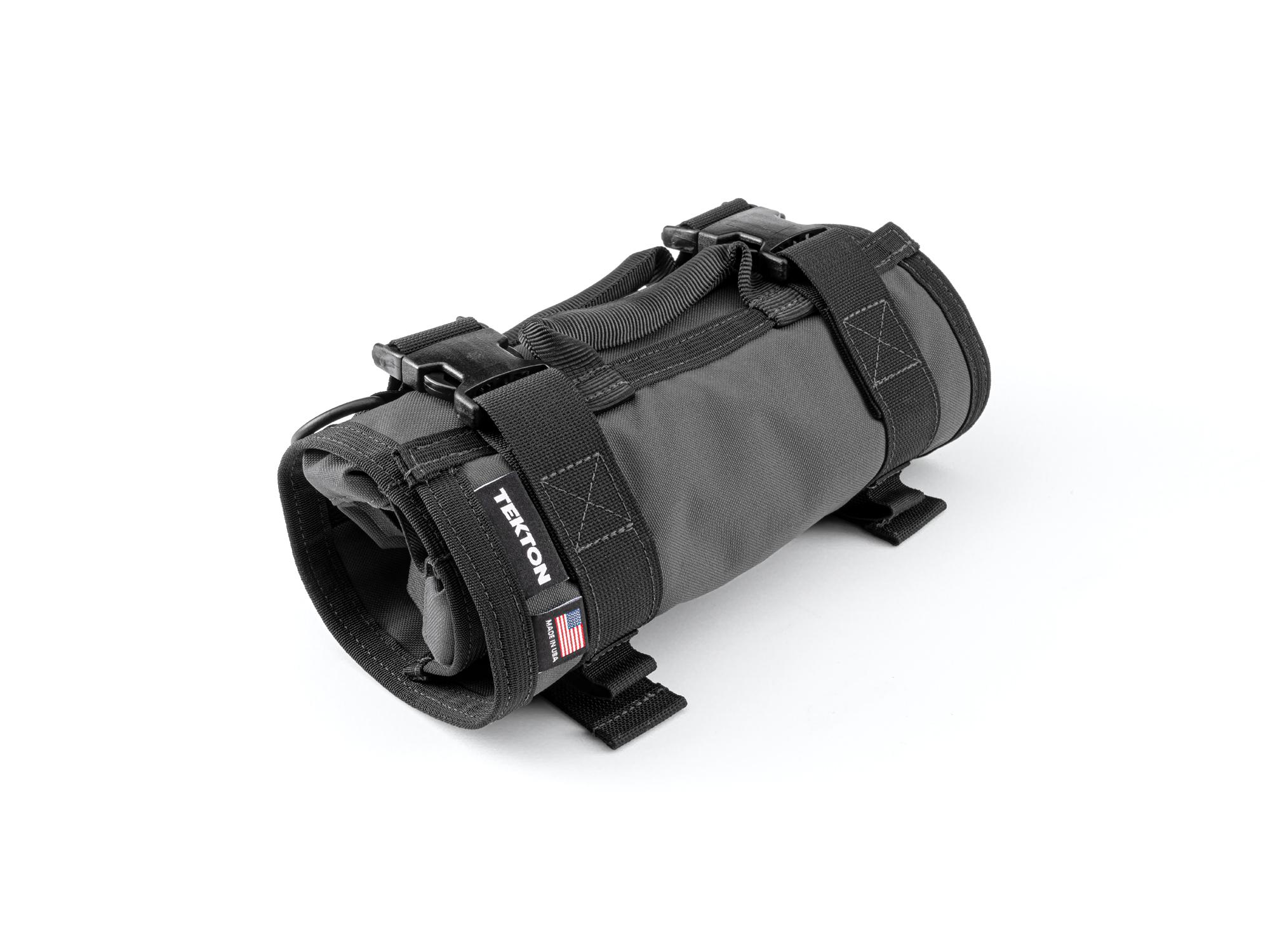 Closed top front-right angle view of tactical-gray-red Tekton roll tool roll. Item #OTR00001