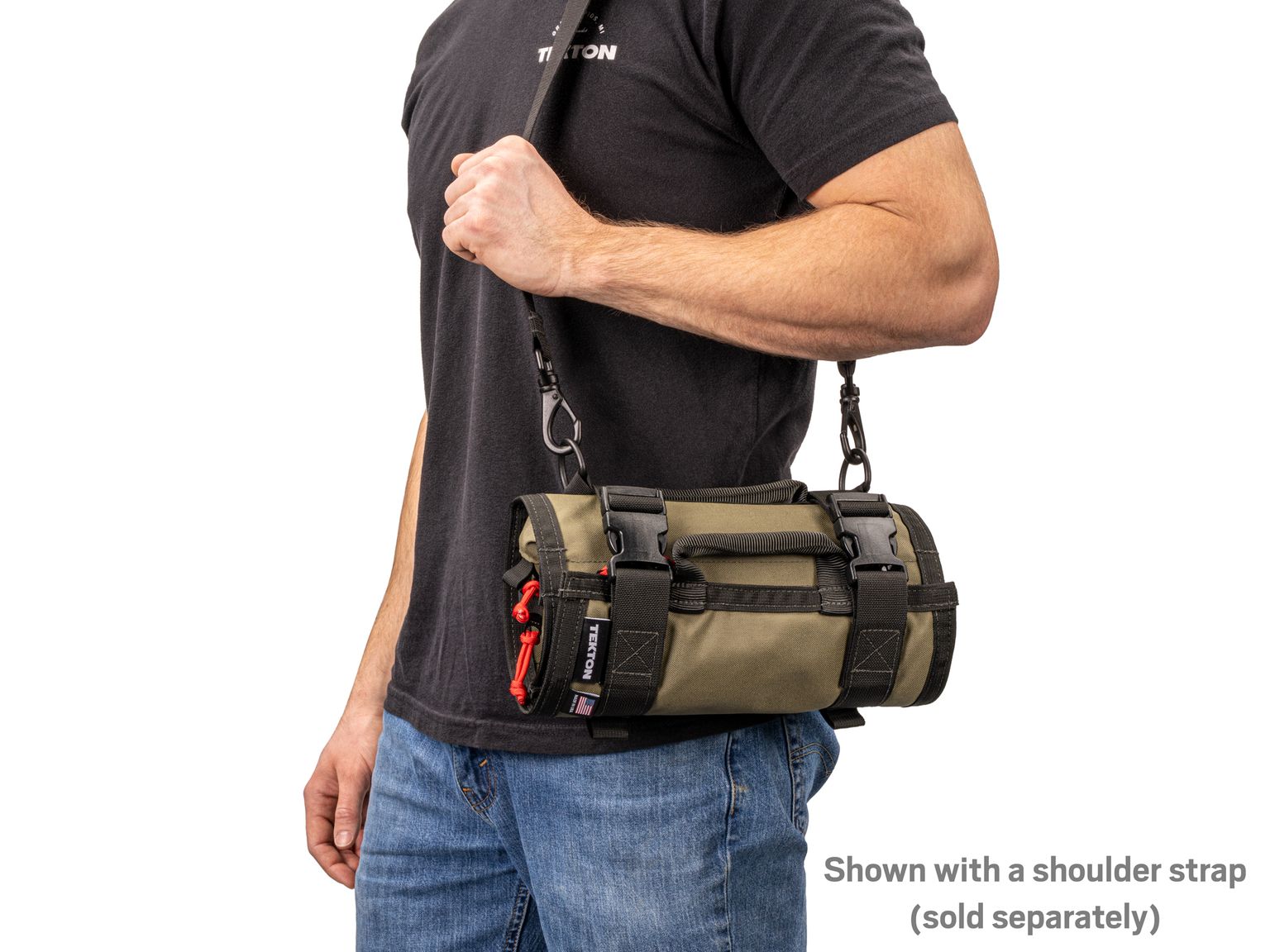 Person holding ranger-green-red Tekton tool roll. Item #OTR00002
