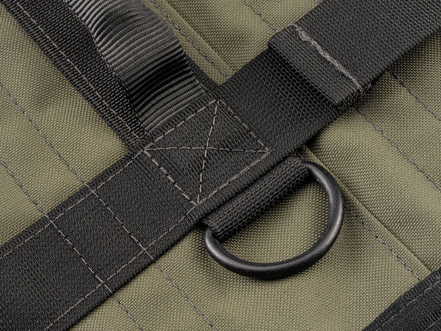 Closeup view of ranger-green-red Tekton tool pouch. Item #OTR00005