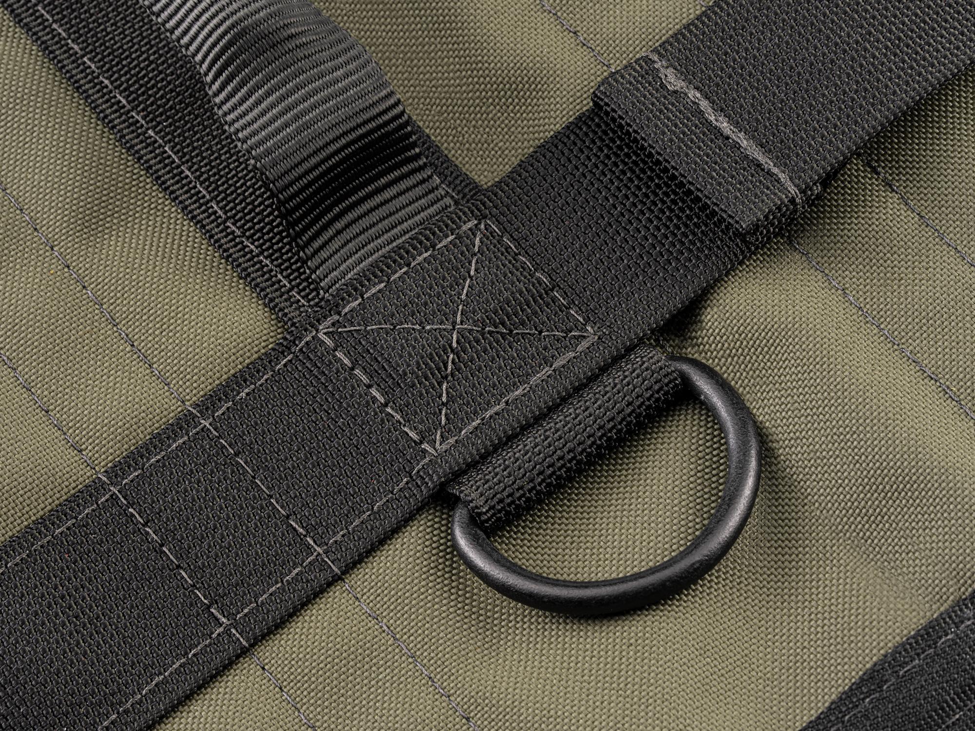 Closeup view of ranger-green-red Tekton roll tool roll. Item #OTR00005