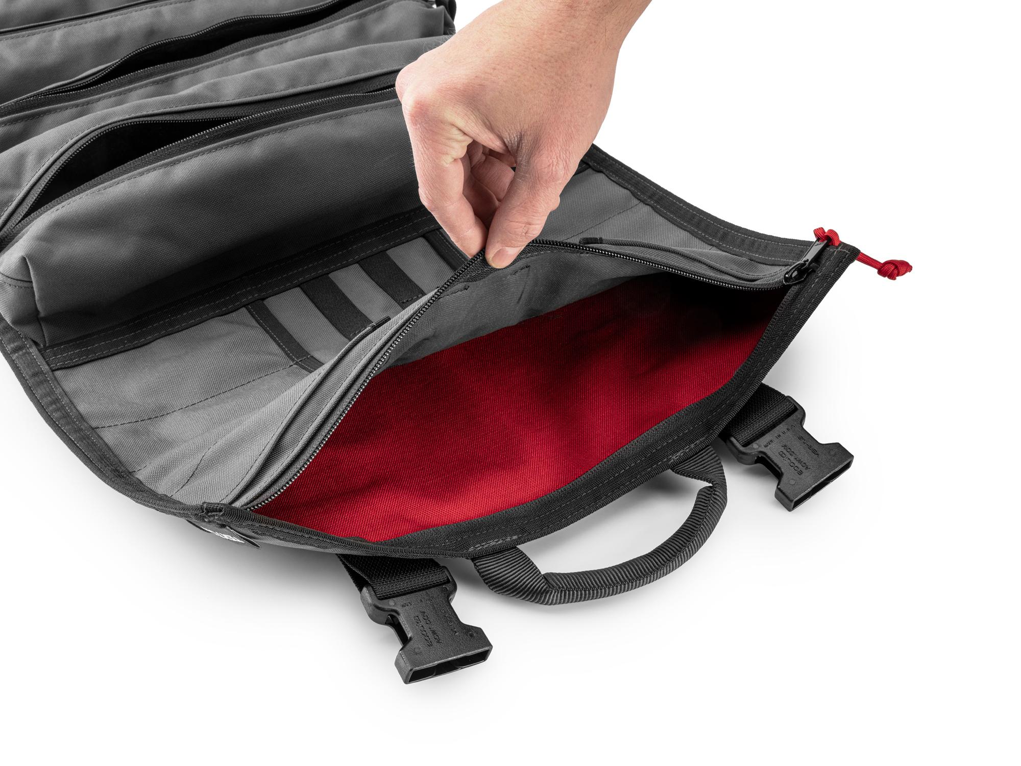 Closeup view of tactical-gray-red Tekton roll tool roll. Item #OTR00007