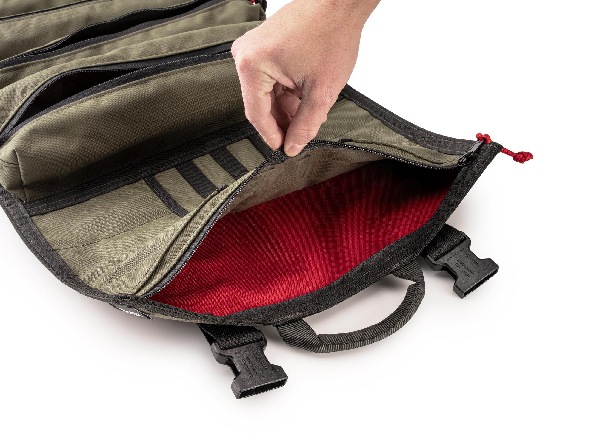 Closeup view of ranger-green-red Tekton roll tool roll. Item #OTR00008