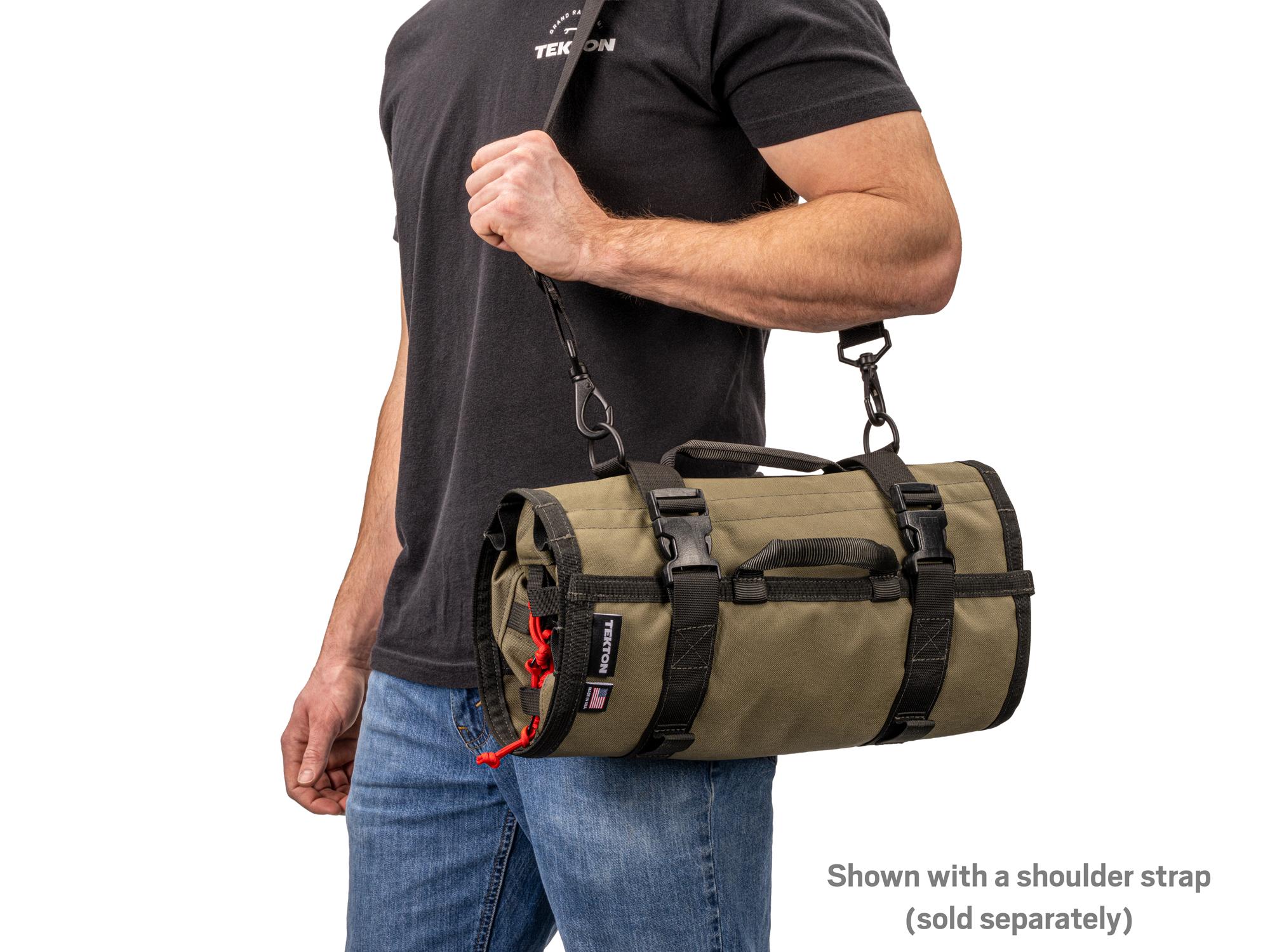 Person holding ranger-green-red Tekton roll tool roll. Item #OTR00008