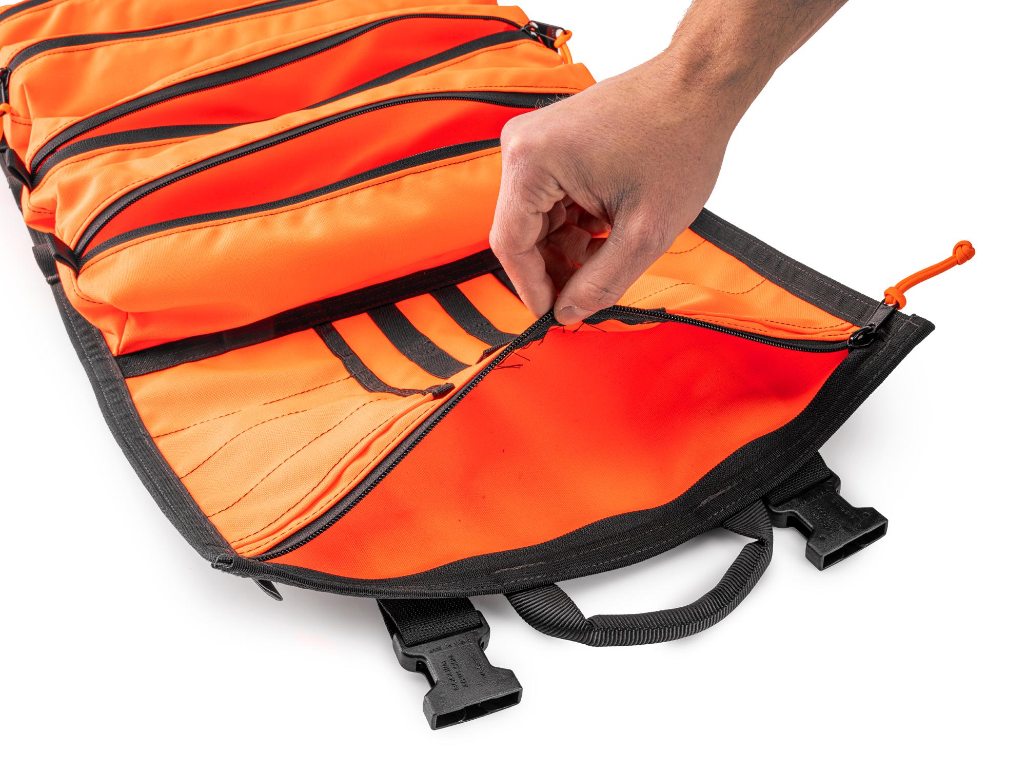 Closeup view of high-vis-orange Tekton roll tool roll. Item #OTR00009