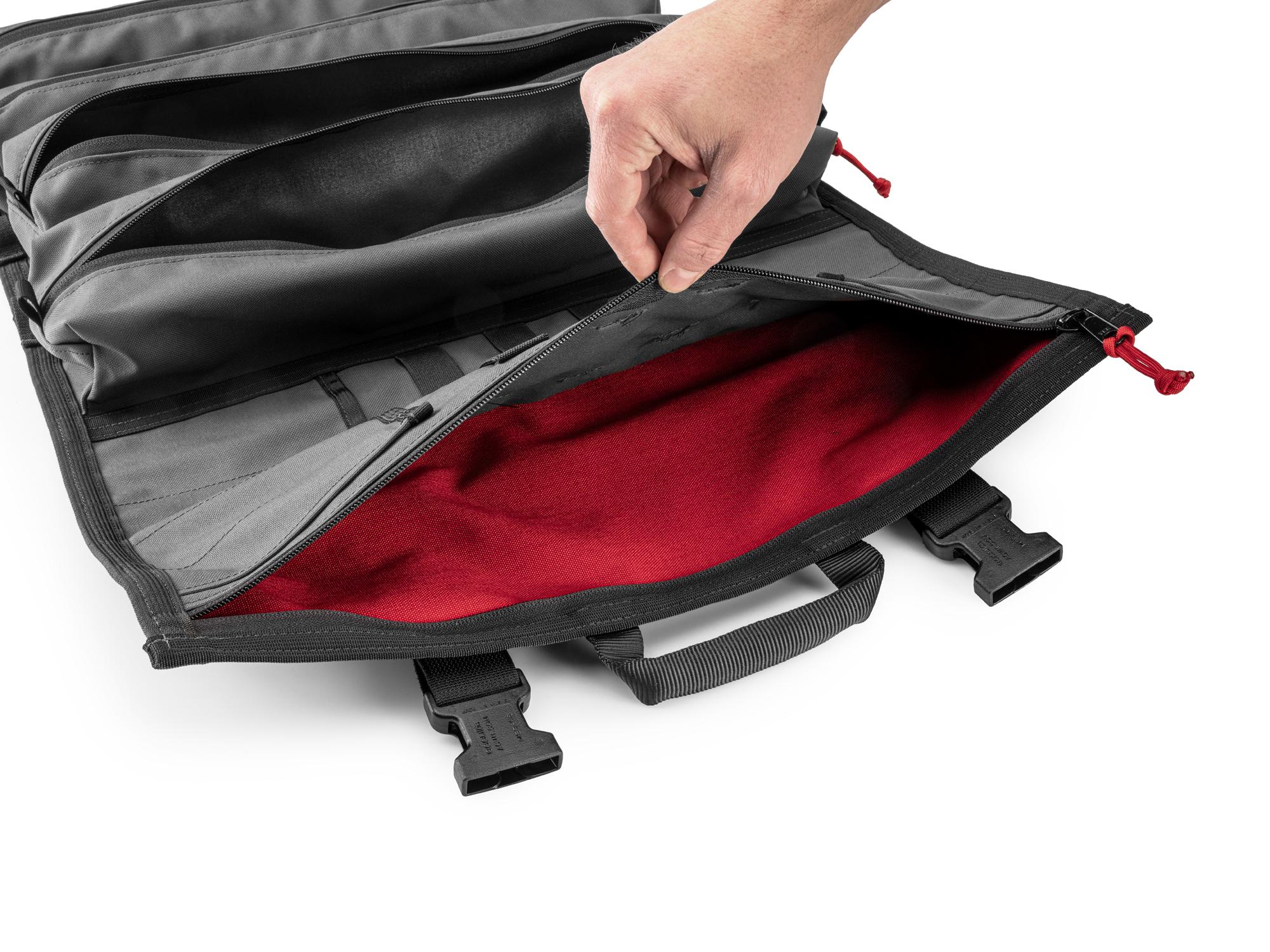 Closeup view of tactical-gray-red Tekton roll tool roll. Item #OTR00010