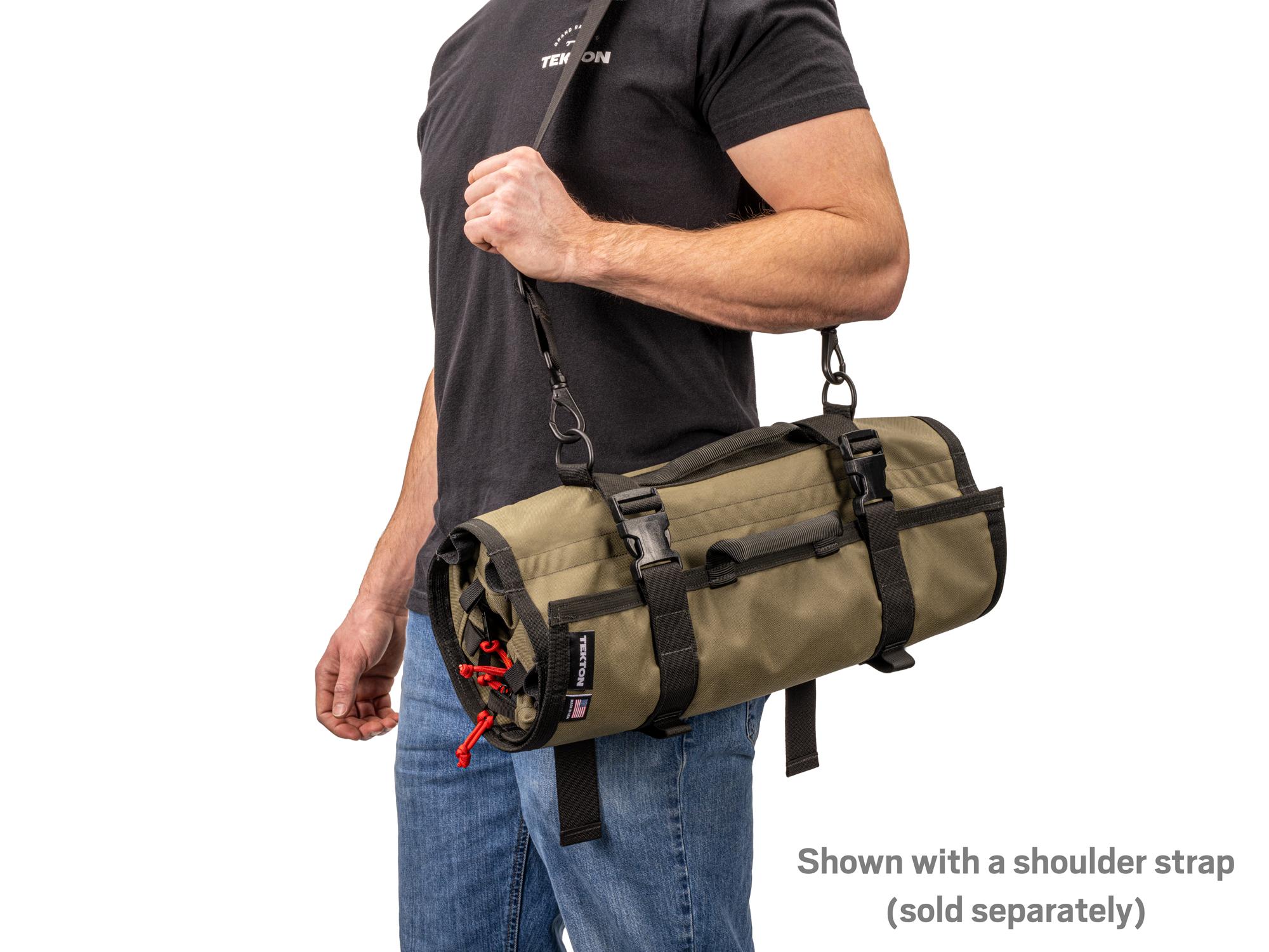 Person holding ranger-green-red Tekton roll tool roll. Item #OTR00011