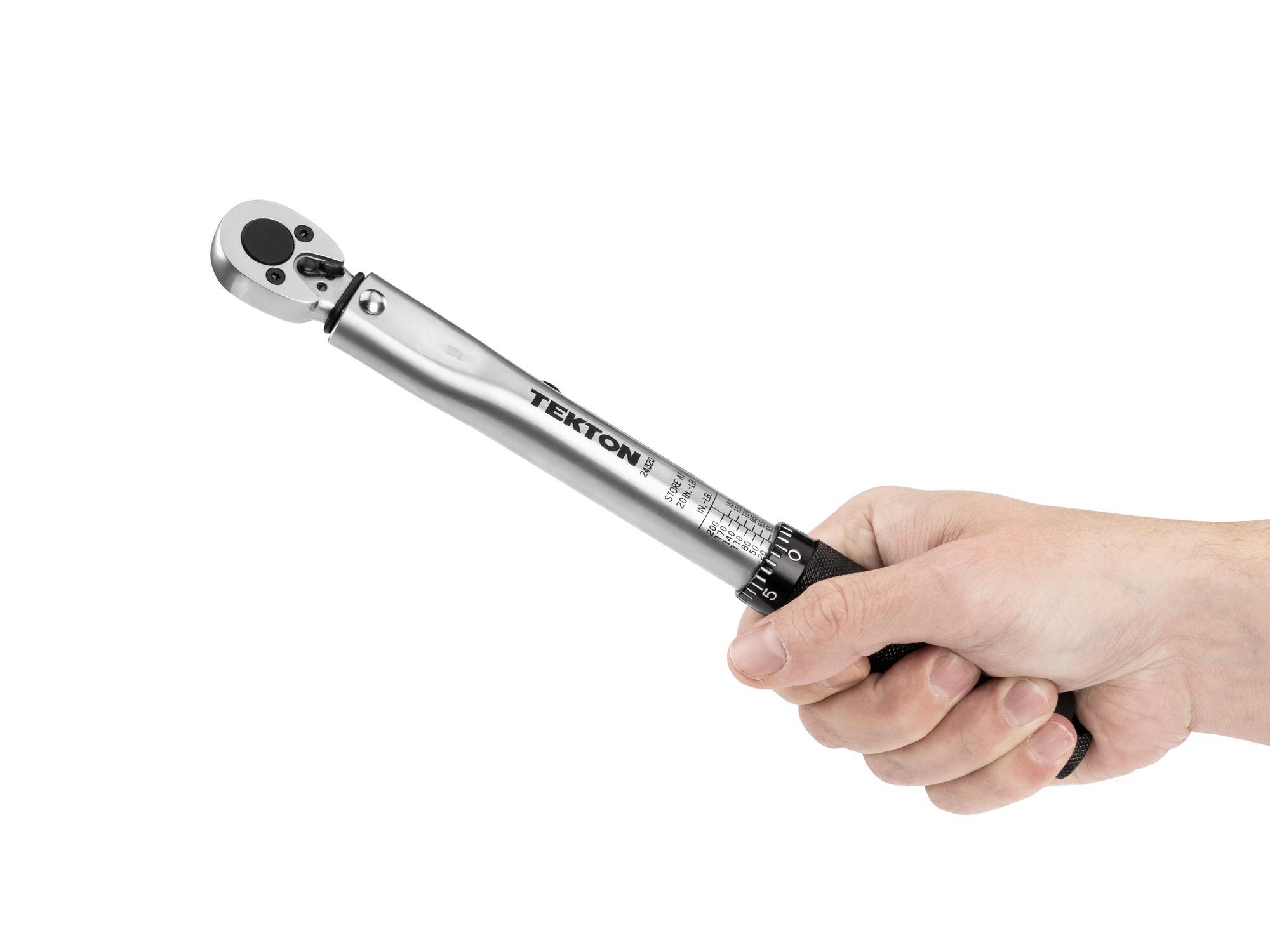 Person holding Tekton case torque wrench. Item #24320