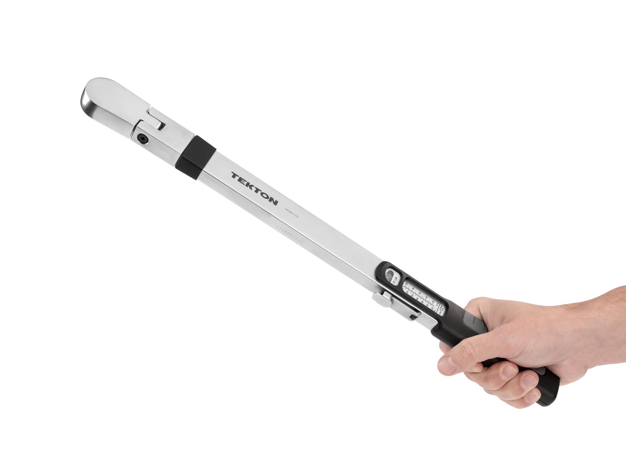 Person holding Tekton case split beam torque wrench. Item #TRQ62103