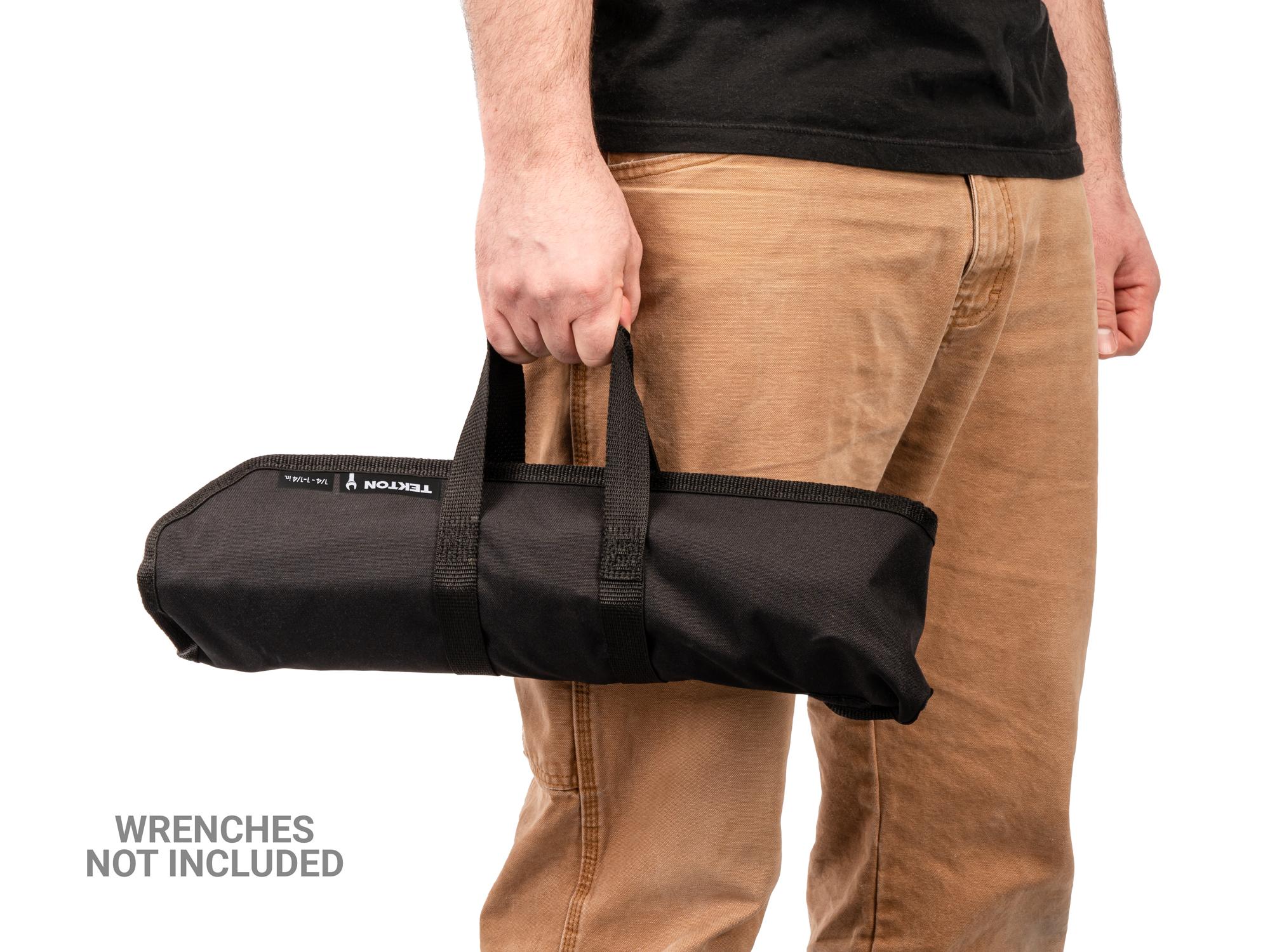 Person holding black Tekton roll wrench organization. Item #OTP21104
