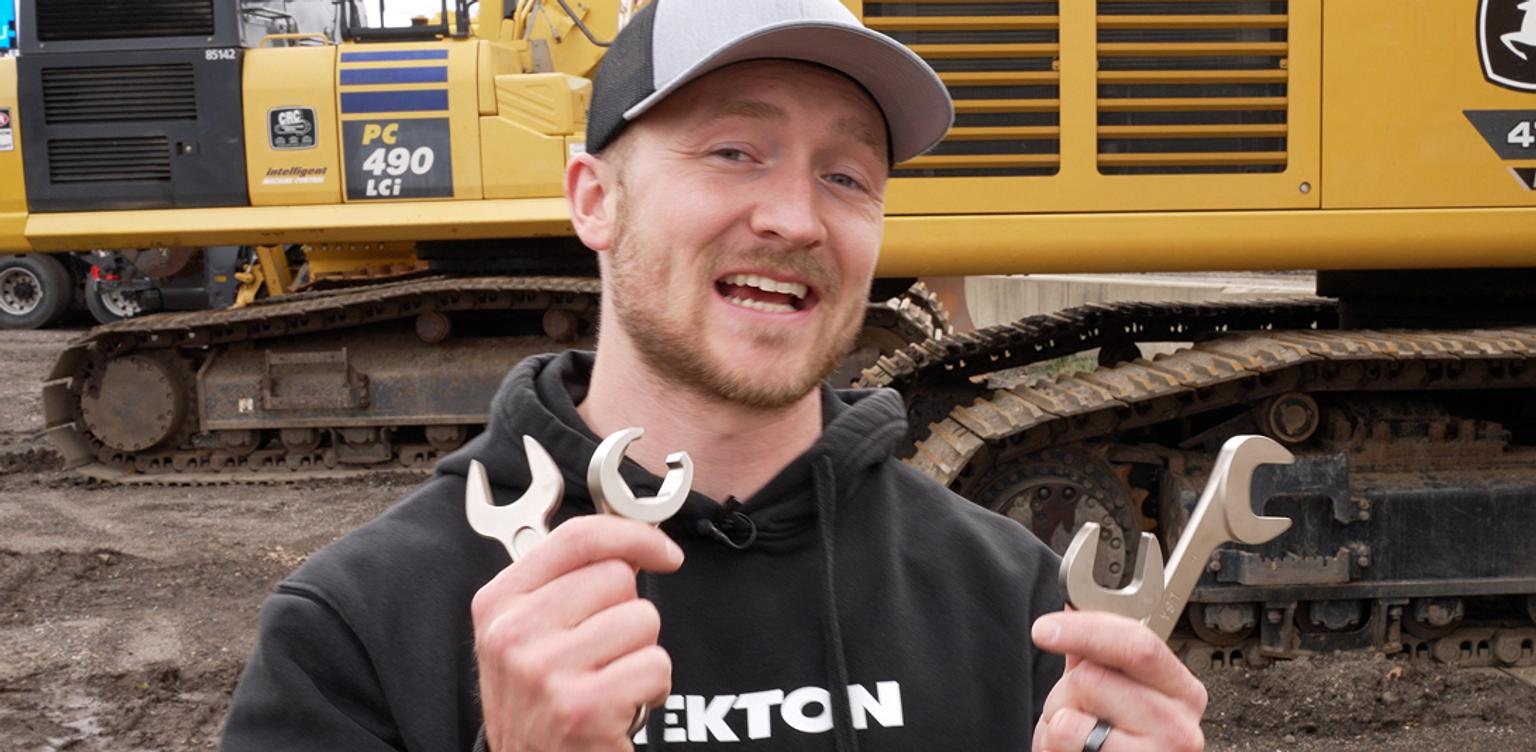 Tekton angle, service, crowfoot, and flare nut crowfoot wrenches on a mat.