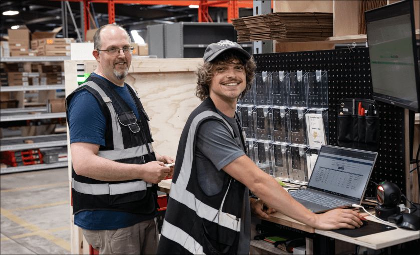 Tekton fulfillment specialist tracking an order on a computer screen.
