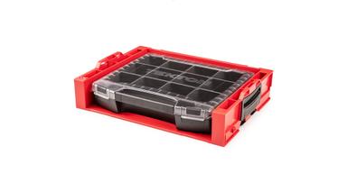 A red and black Tekton tool box drawer in a rack.