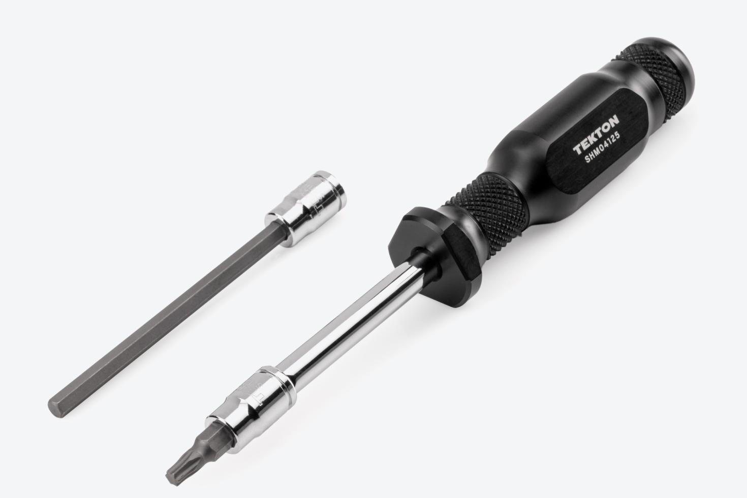 A 6.5 inch spinner handle connected to a star bit socket next to a long hex bit socket