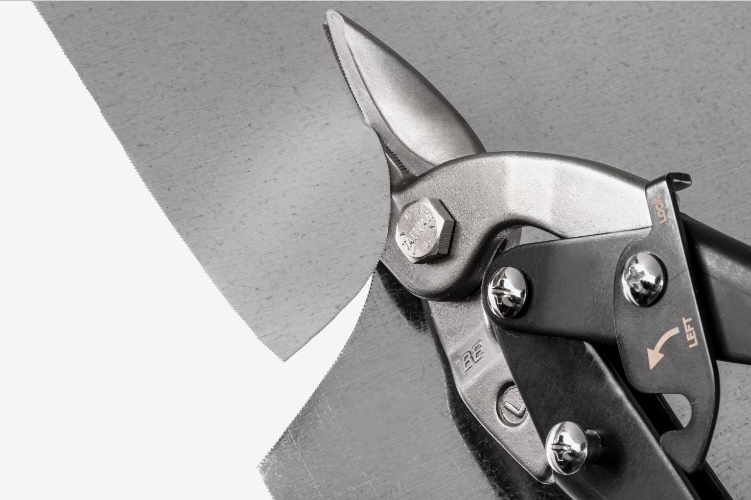 Snips cutting sheet metal