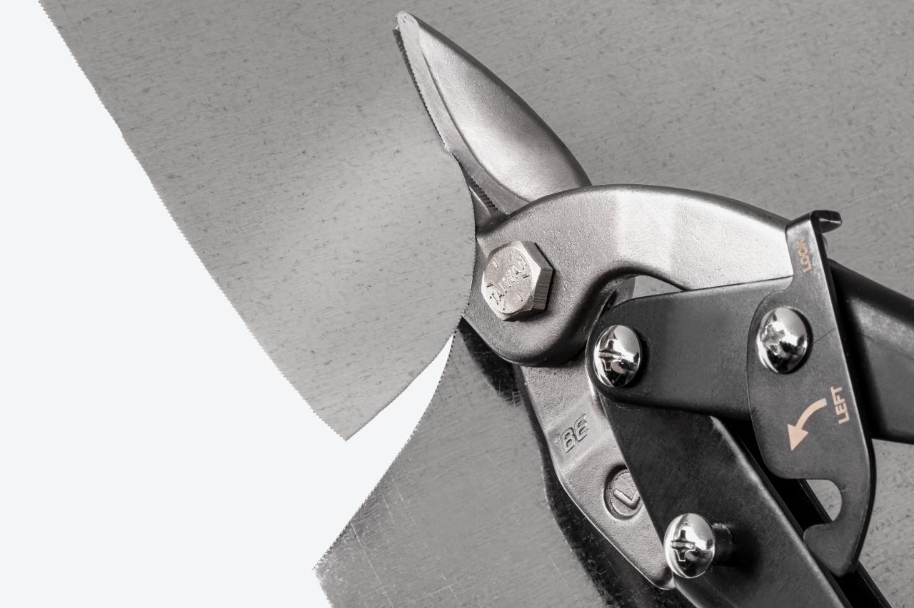 Snips cutting sheet metal