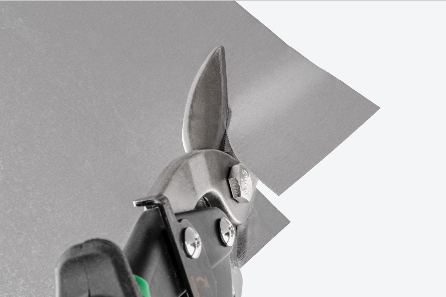 Snips cutting sheet metal