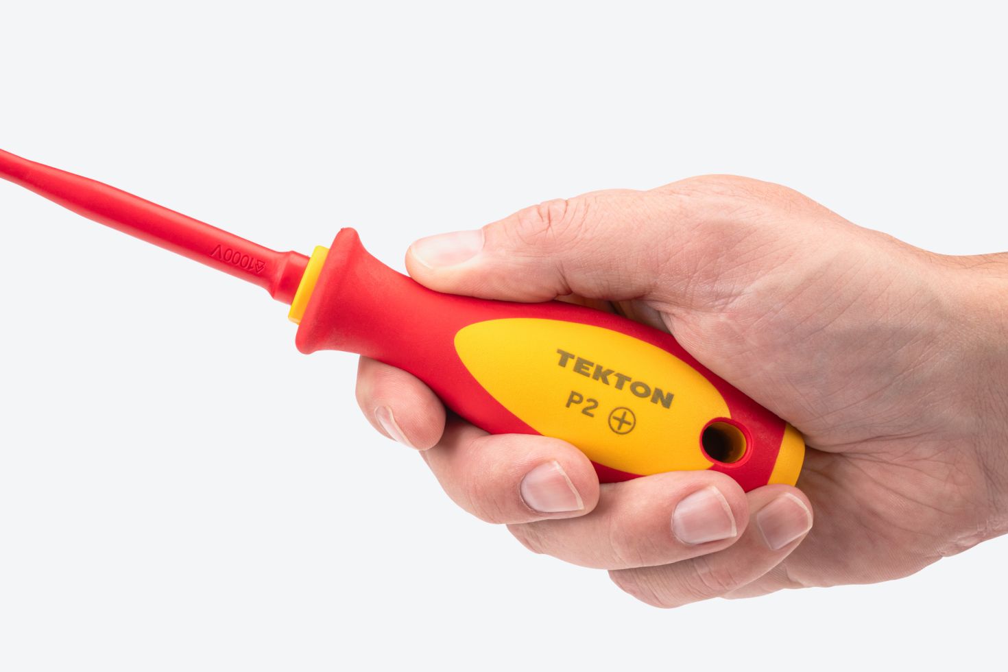 A hand holding a Tekton P2 insulated screwdriver #DVP00302