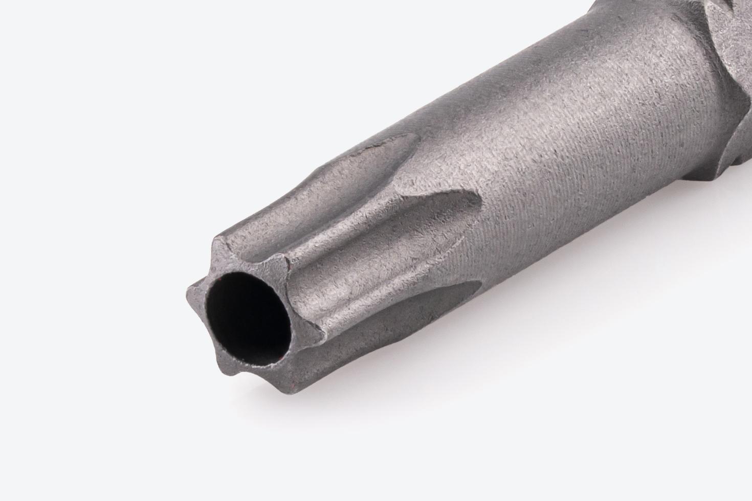 Close-up image of the tip of a tamper star bit.