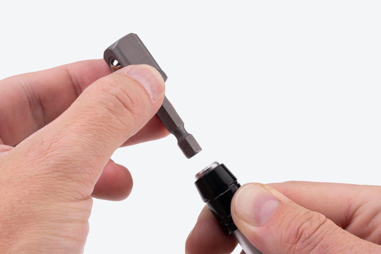 An adapter being removed from a driver