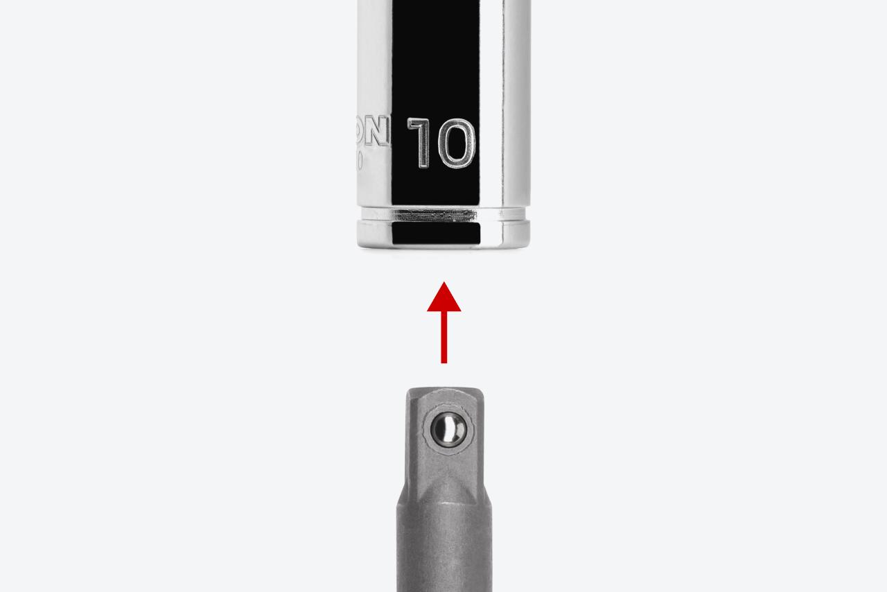 An adapter and a 1/4 inch drive socket