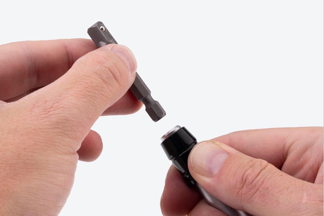 An adapter being removed from a driver