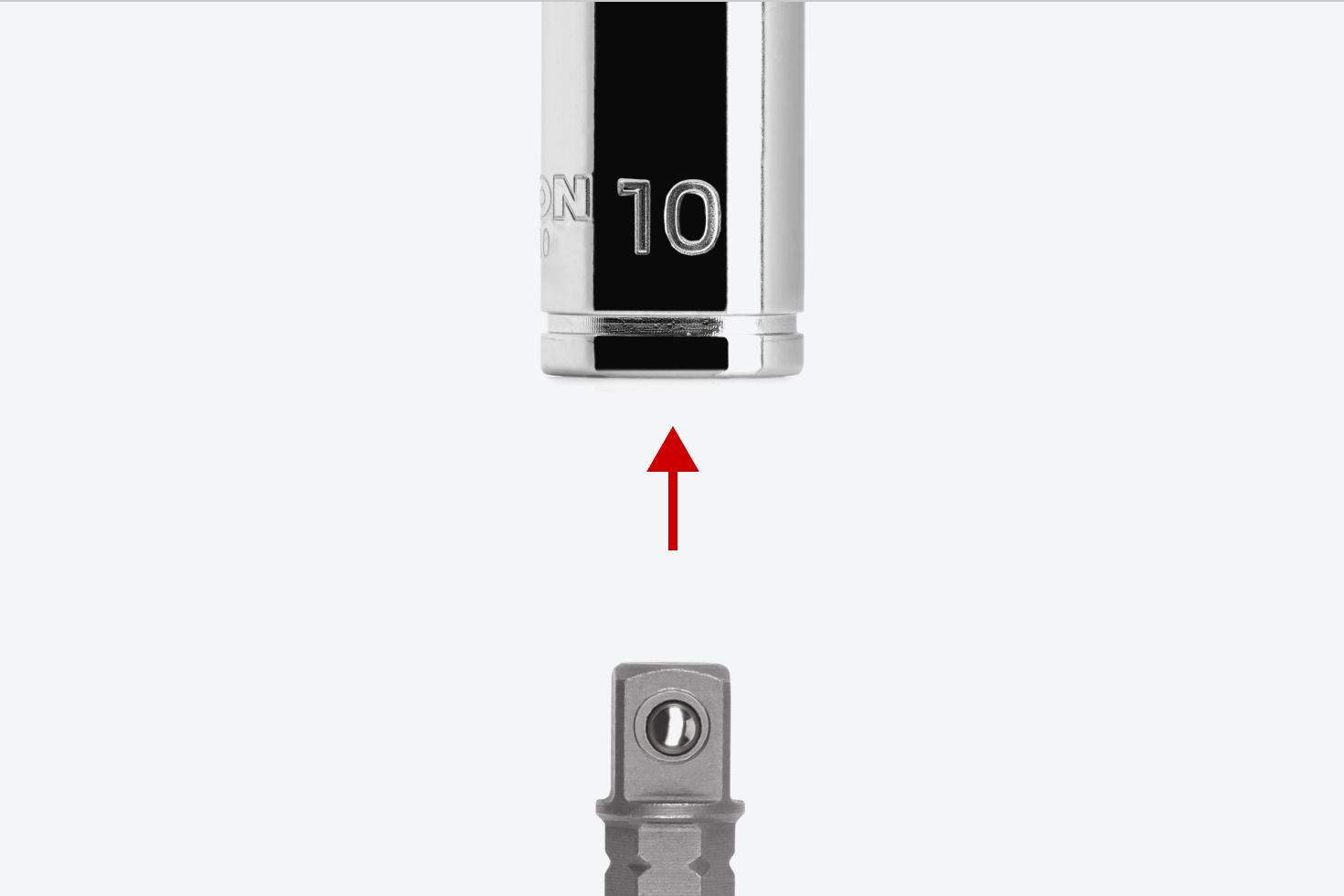 An adapter and a 1/4 inch drive socket