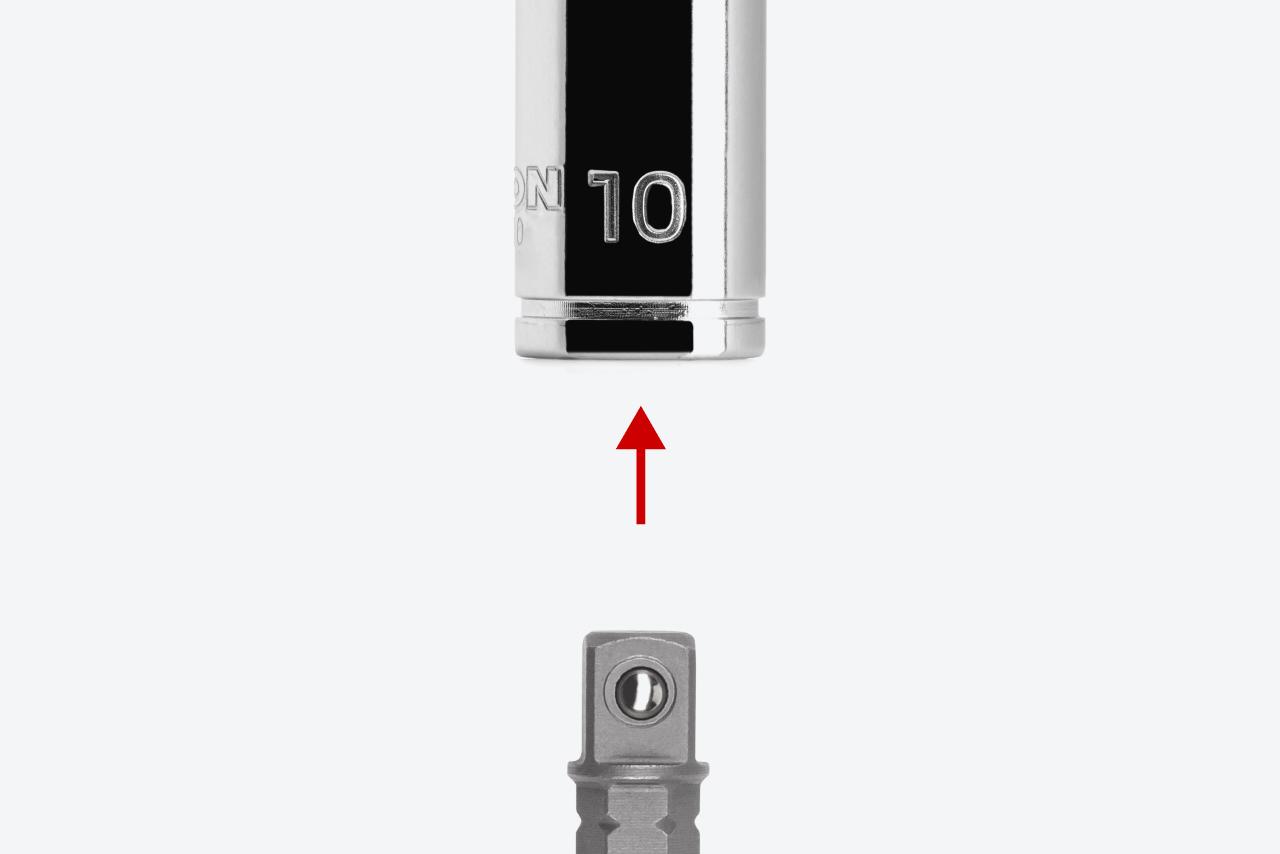 An adapter and a 1/4 inch drive socket