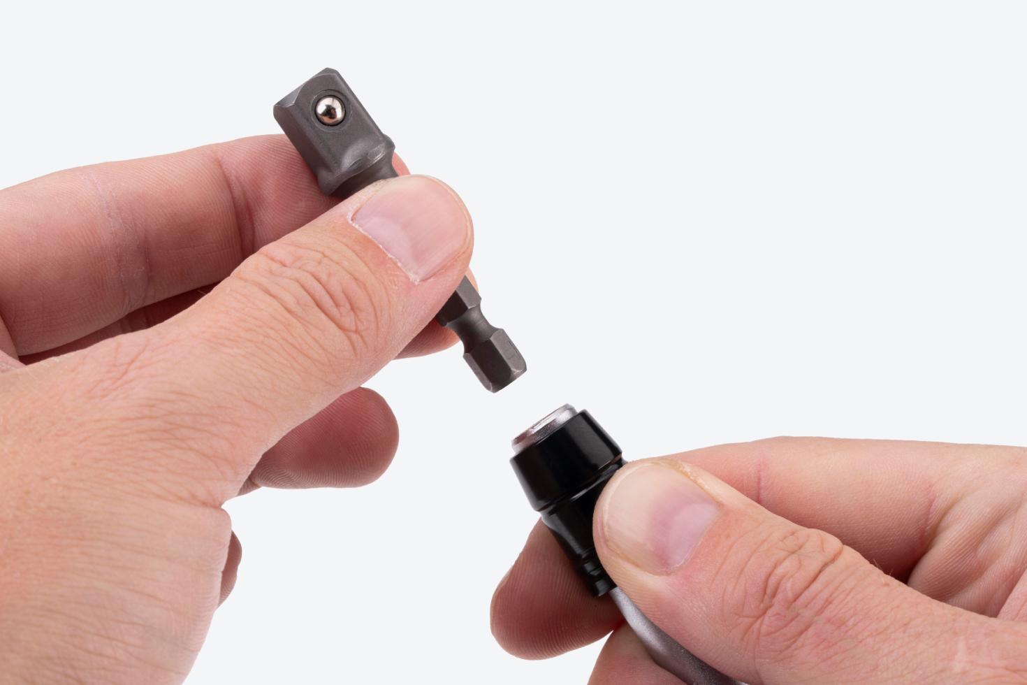 An adapter being removed from a driver