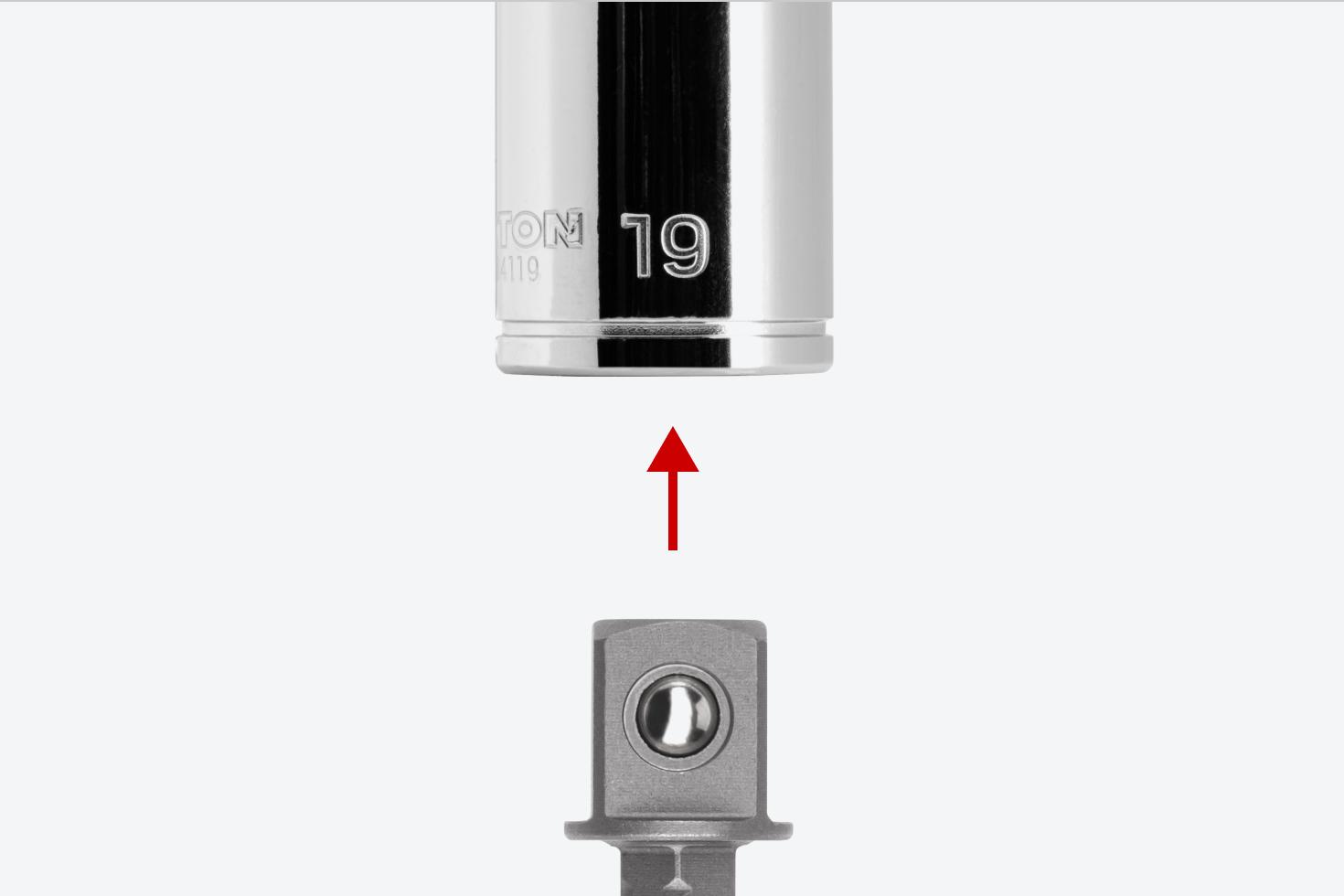 An adapter and a 3/8 inch drive socket