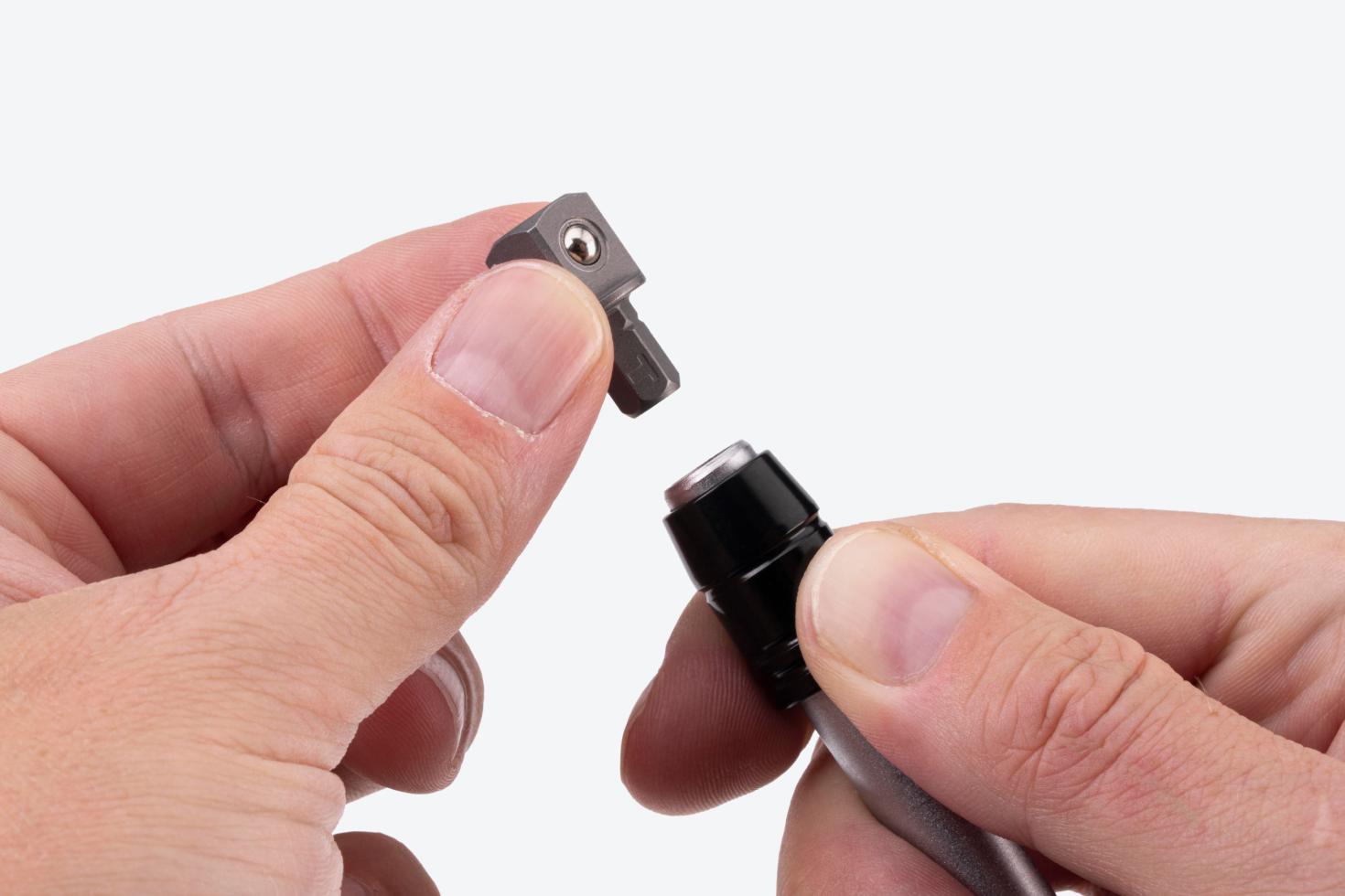 An adapter being removed from a driver