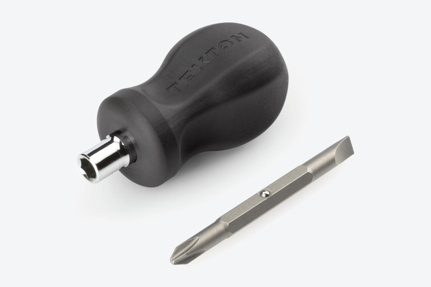 A Phillips/slotted screwdriver bit next to a black 3-in-1 stubby driver handle