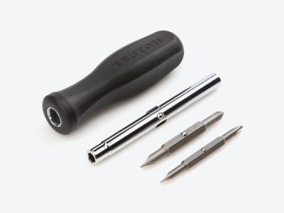 All of the components of a 6-in-1 driver next to each other