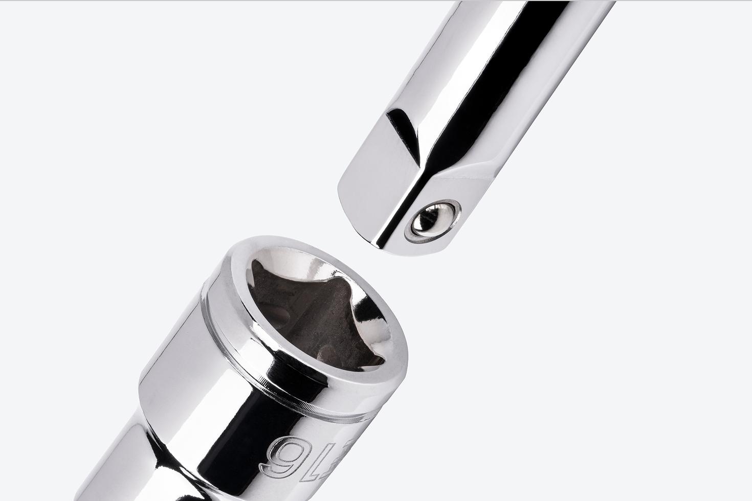 A hand drive extension going into the drive end of a Tekton 1/2 Inch Drive x E16 External Star Socket.